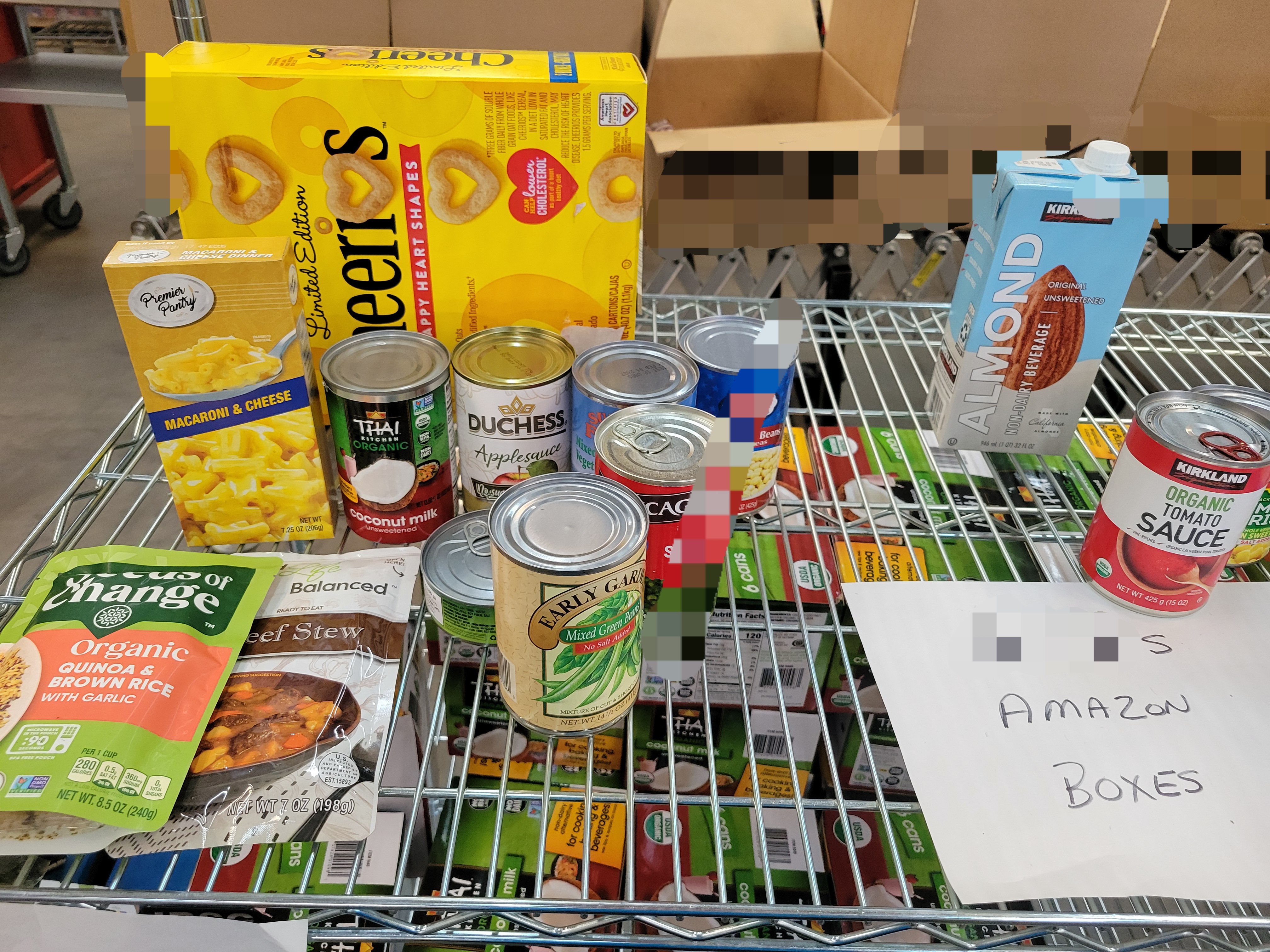Dry goods on a shelf with piece of a paper that says amazon box.